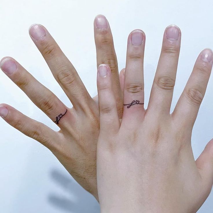 ring finger tattoo for women